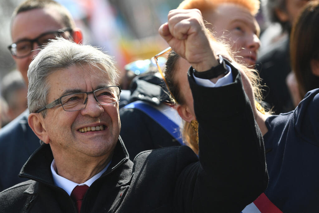 "La France Insoumise" (LFI) party presidential candidate Jean-Luc Melenchon gestures as he takes part in his traditional presidential march in Paris, on March 20, 2022.