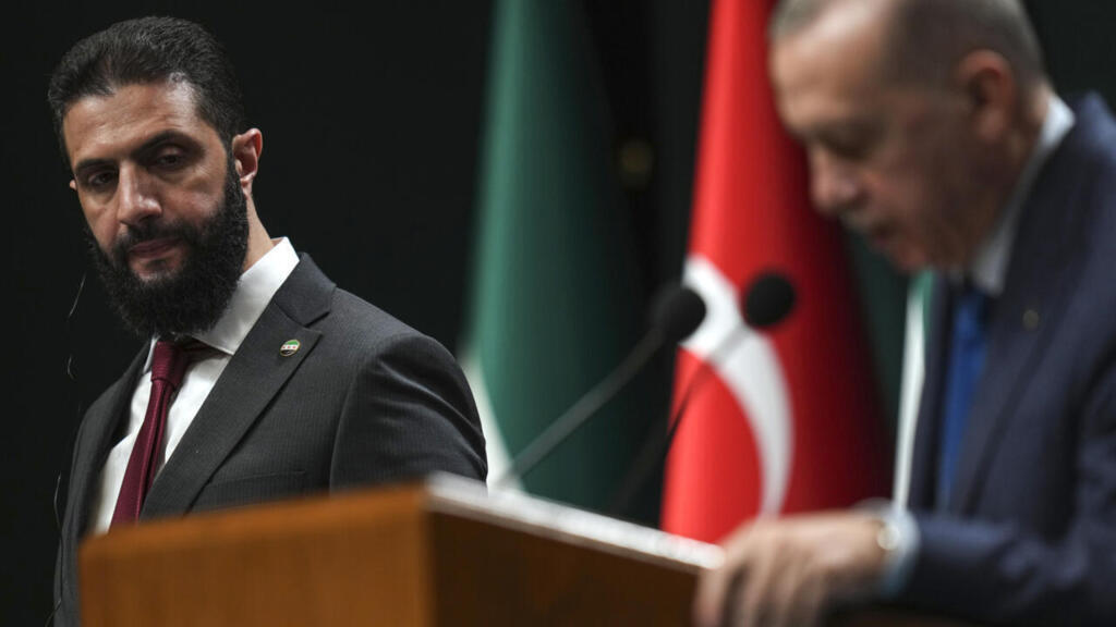 Turkish President Recep Tayyip Erdogan, right, and Syria's interim President Ahmad al-Sharaa, hold a joint press conference following their meeting at the presidential palace in Ankara in February.