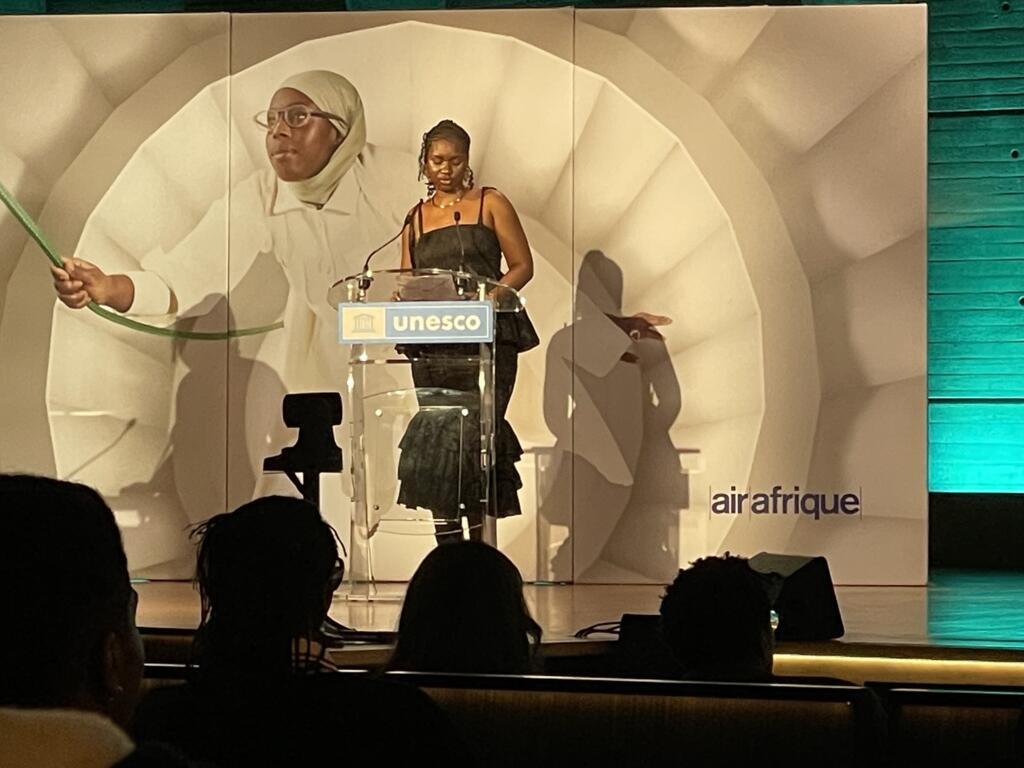 Amandine Nana presents Air Afrique Magazine's second edition at the Unesco headquarter in Paris in April 2025.