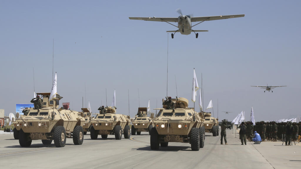 Taliban Military Vehicles are displayed during a military parade to mark the third anniversary of the withdrawal of U.S.-led troops from Afghanistan, in Bagram Air Base in the Parwan