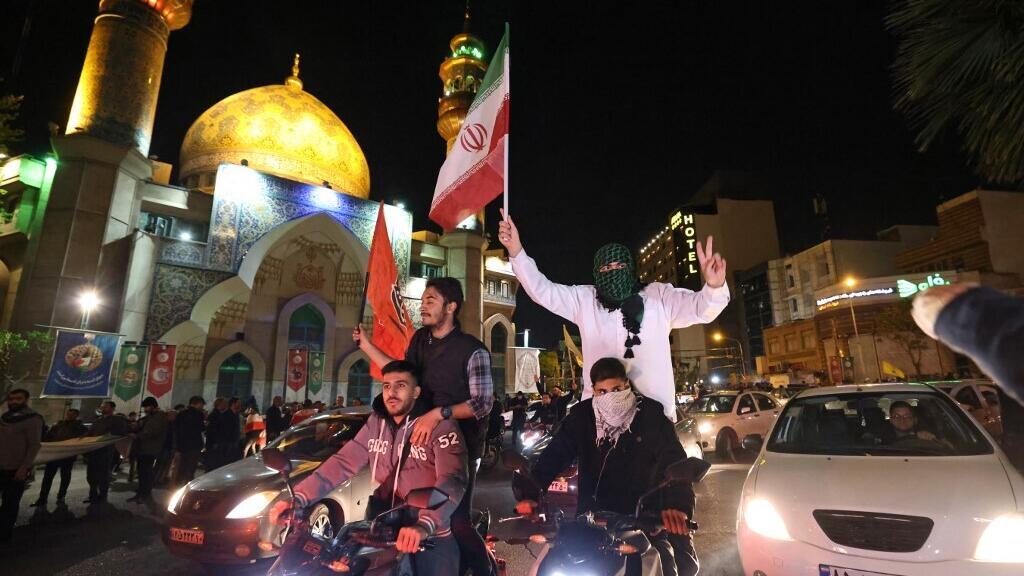Des manifestants iraniens fêtent l'attaque lancée par l'Iran contre Israël ce 14 avril 2024 à Téhéran. (Image d'illustration)