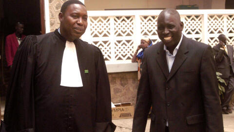 Senegalese media mogul Madiambal Diagne is the subject of an international arrest warrant. Pictured here in 2006 with his solicitor 