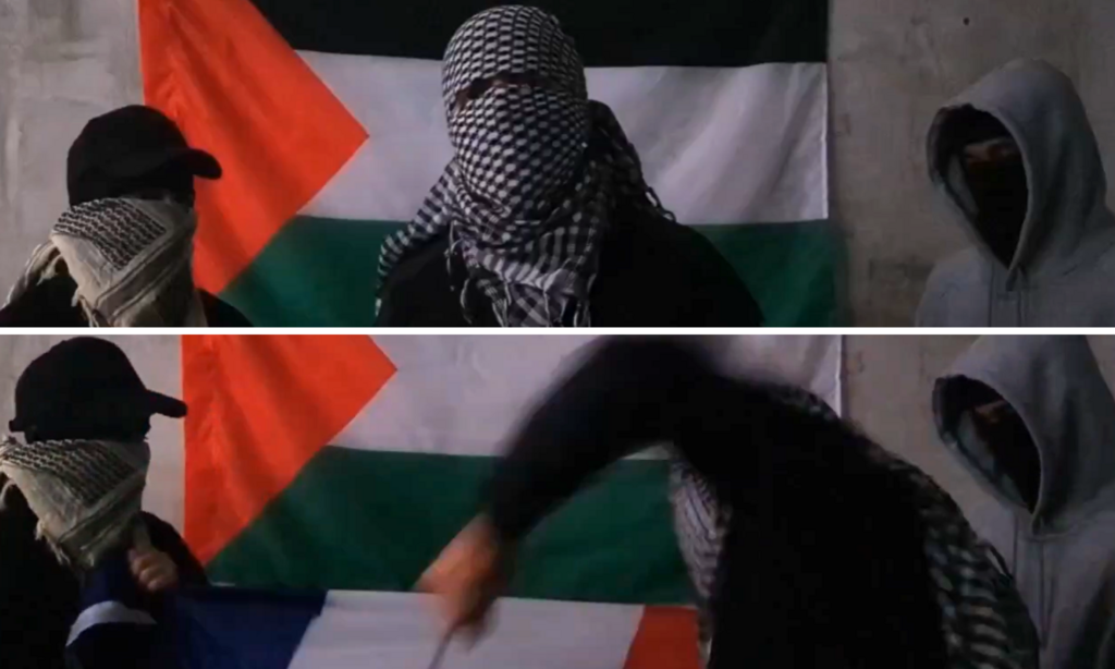 L'homme encagoulé menace la France avant de déchirer son drapeau.
