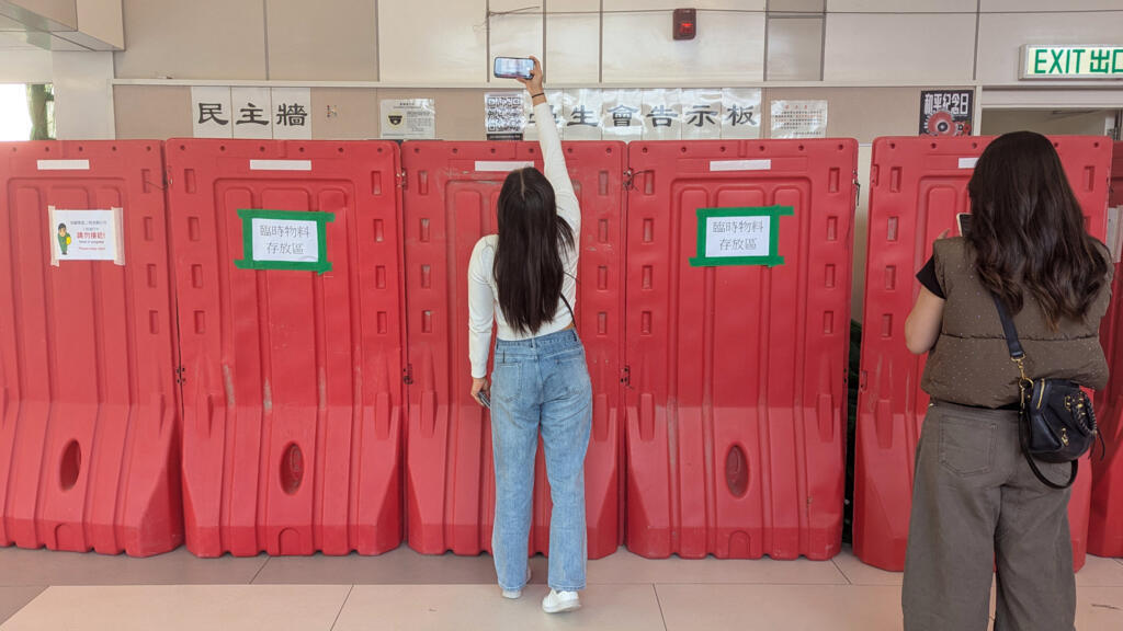 Hong Kong: une université suspend un syndicat étudiant demandant justice après l'incendie de Tai Po