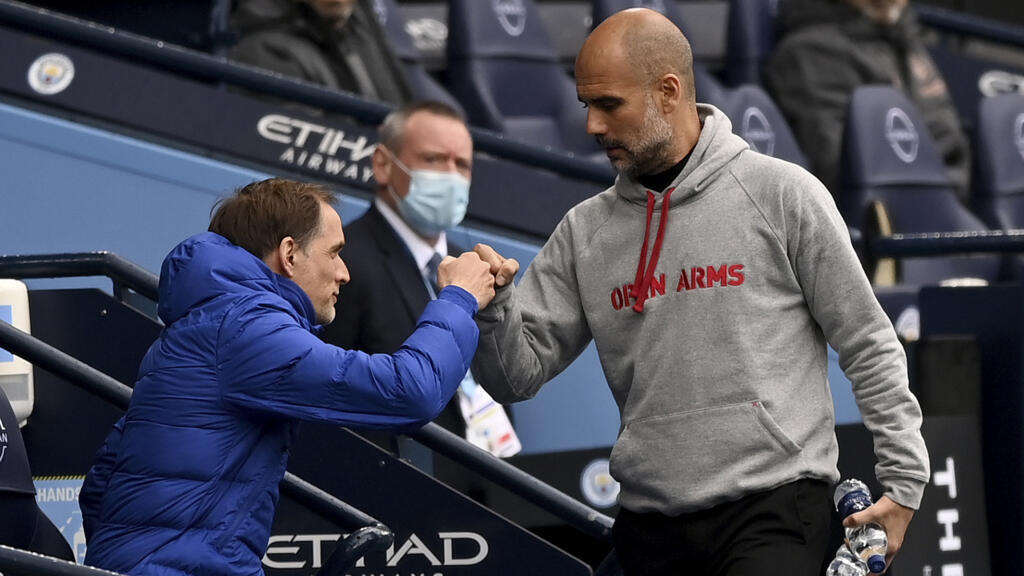 Les entraîneurs Thomas Tuchel (Chelsea) et Pep Guardiola (Manchester City), le 8 mai 2021.