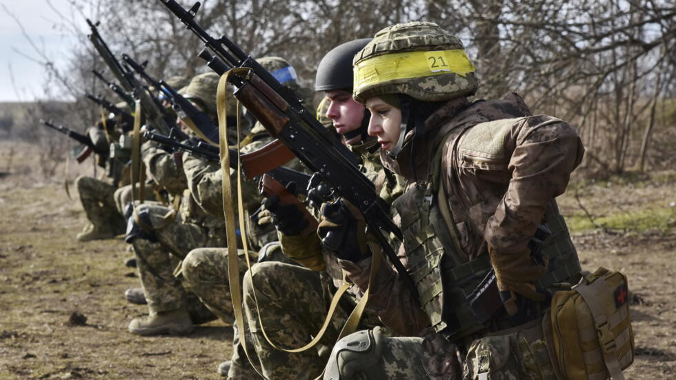 In this photo provided by Ukraine's 65th Mechanised Brigade press service, Ukrainian servicemen train at the military training ground in the Zaporizhzhia region, Ukraine, Monday, March 10, 2025. (Andr