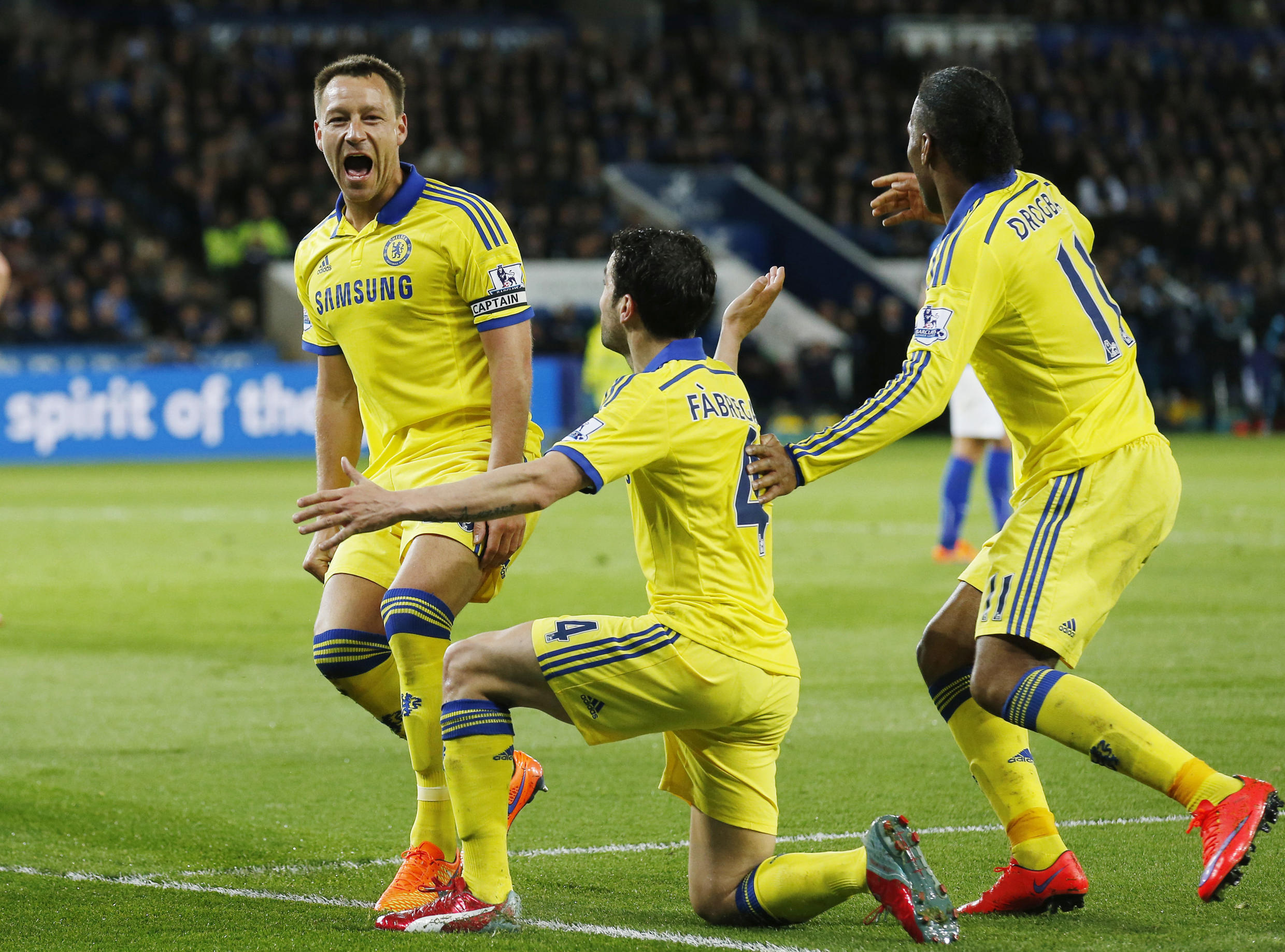 John Terry celebrates with team mates after scoring the second goal for Chelsea