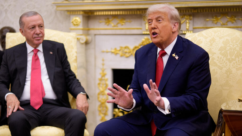 US President Donald Trump, with Turkish President Recep Tayyip Erdogan, speaks during a meeting in the Oval Office at the White House in Washington on 25 September 2025.