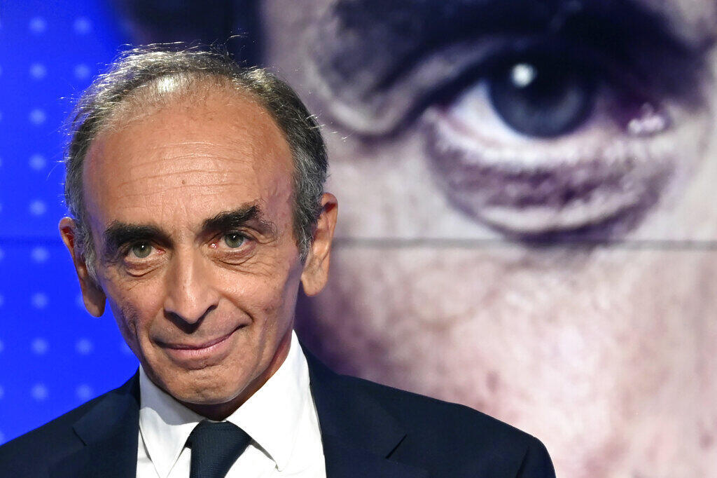 French far-right media personality Eric Zemmour poses before a televised debate with French far-left leader Jean-Luc Melenchon on 23 September 2021 in Paris.