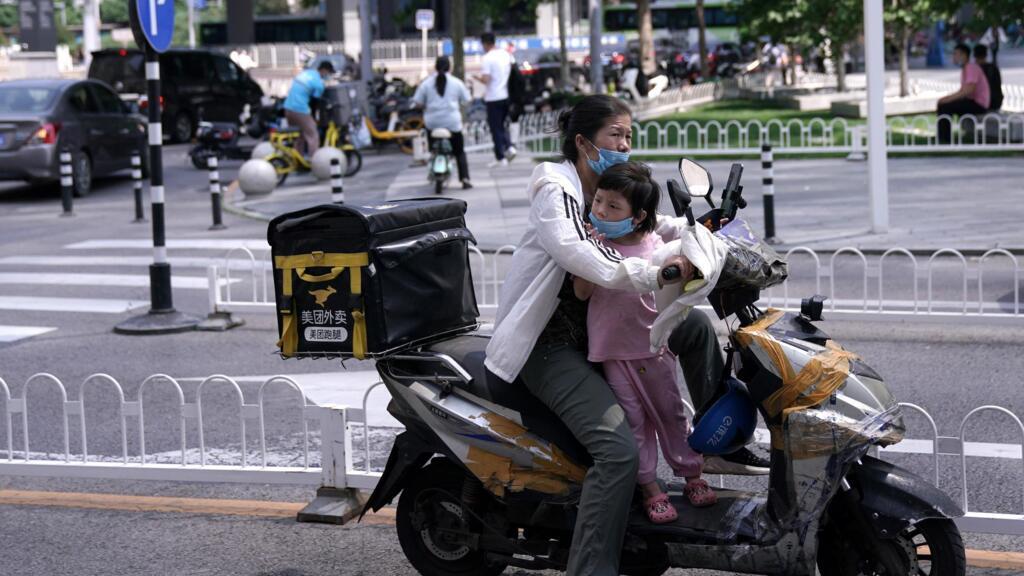 Dans une rue du quartier d'affaires de Pékin, le 23 juillet 2020.