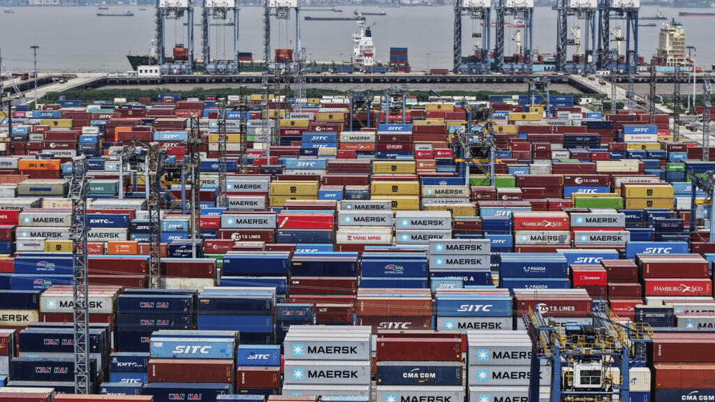China Trump TariffsContainers are pile up at a container terminal in Shanghai, China, Sunday, April 20, 2025. (Chinatopix Via AP)