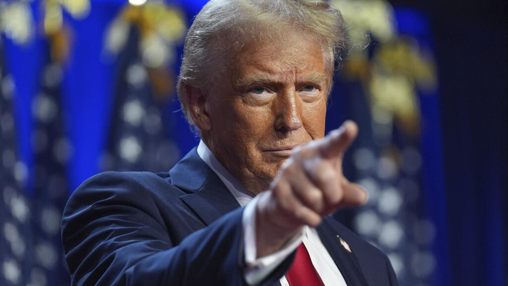 Republican presidential nominee former President Donald Trump arrives at an election night watch party at the Palm Beach Convention Center, Wednesday, Nov. 6, 2024, in West Palm Beach, Fla.