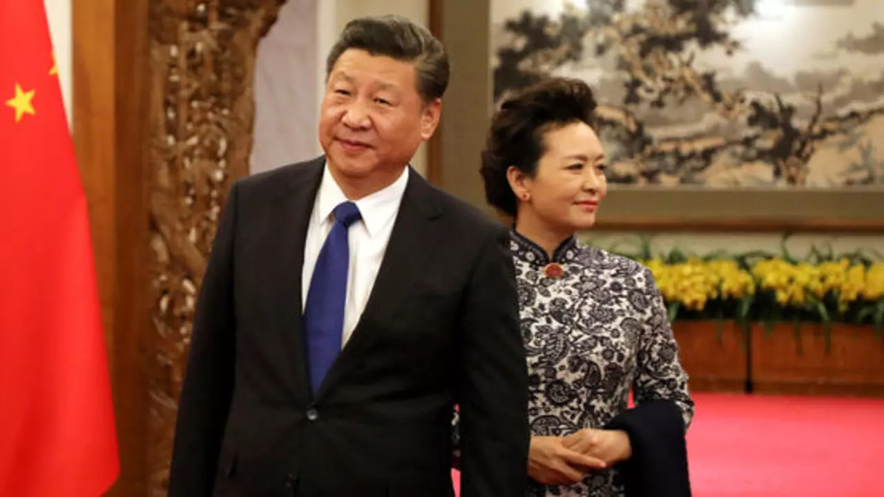 中国国家主席习近平和夫人彭丽媛 2018年1月8日在北京