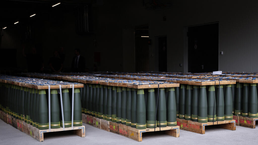 155mm artillery shells are on display during the inauguration of the new munitions plant of German automotive and arms manufactuer Rheinmetall, in Unterluess, northern Germany on August 27, 2025. Germ