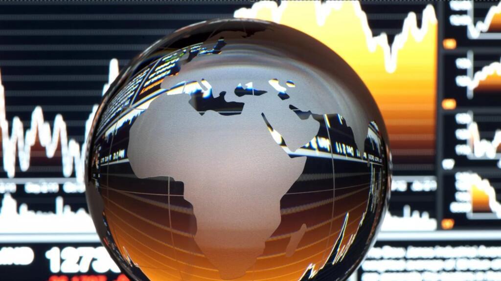 Image RFI Data / Global finance concept. Financial data with globe in foreground. Globe shows Europe